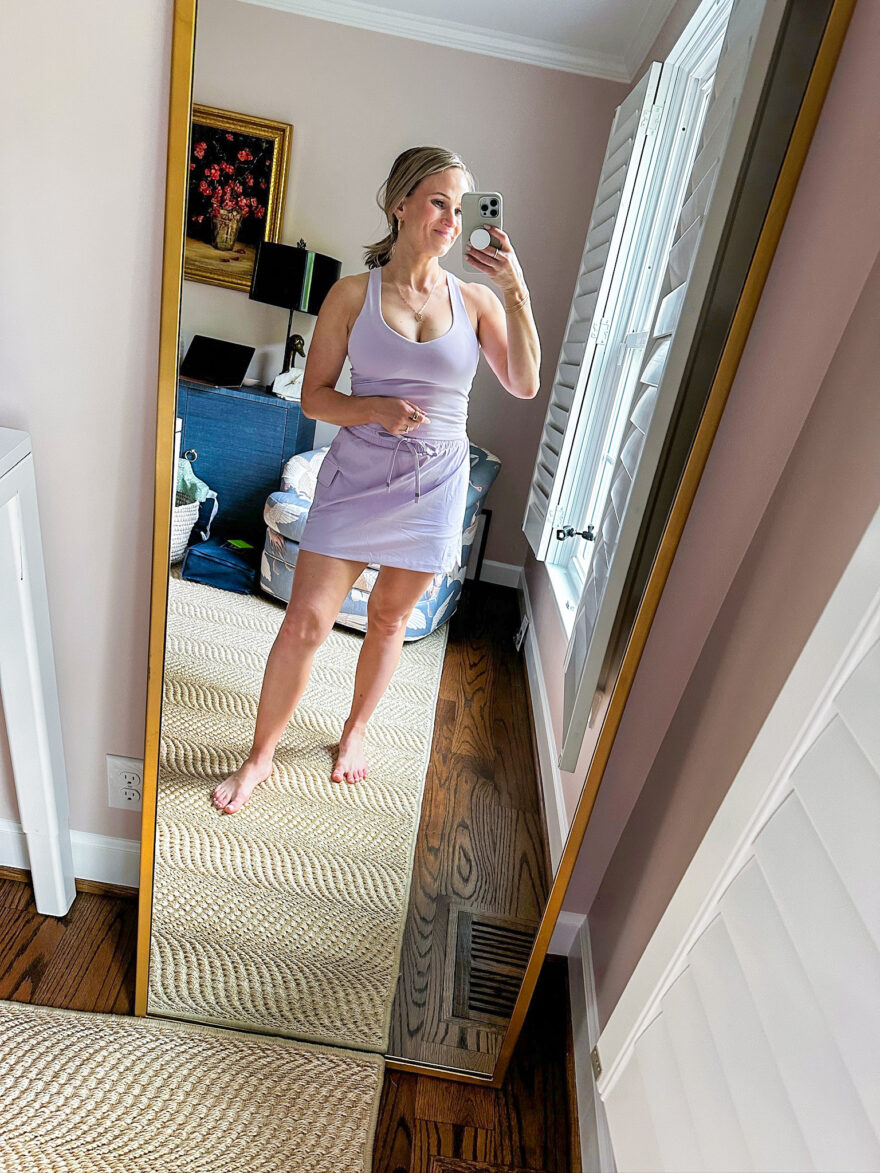 TeriLyn Adams wearing the Anywhere Built-In Bra Tank with the One Cargo Skirt in lavender as an outfit from Fabletics