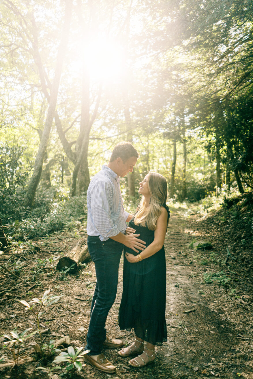 TeriLyn Adams taking a photo with her husband and wearing black dress